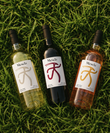 Mescla Wine Bottles in Grass